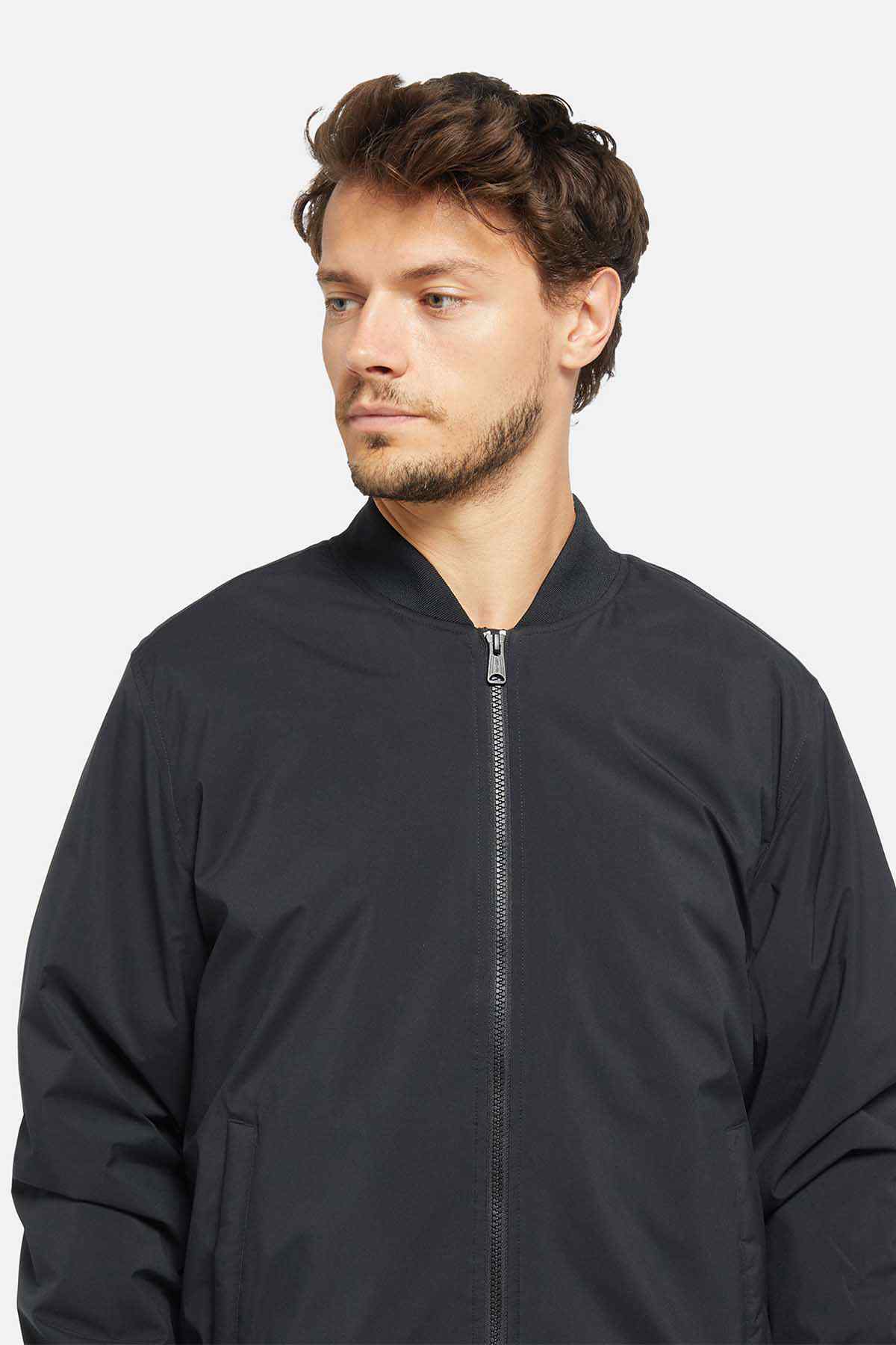 Black bomber jacket with full front zipper and stand collar detail