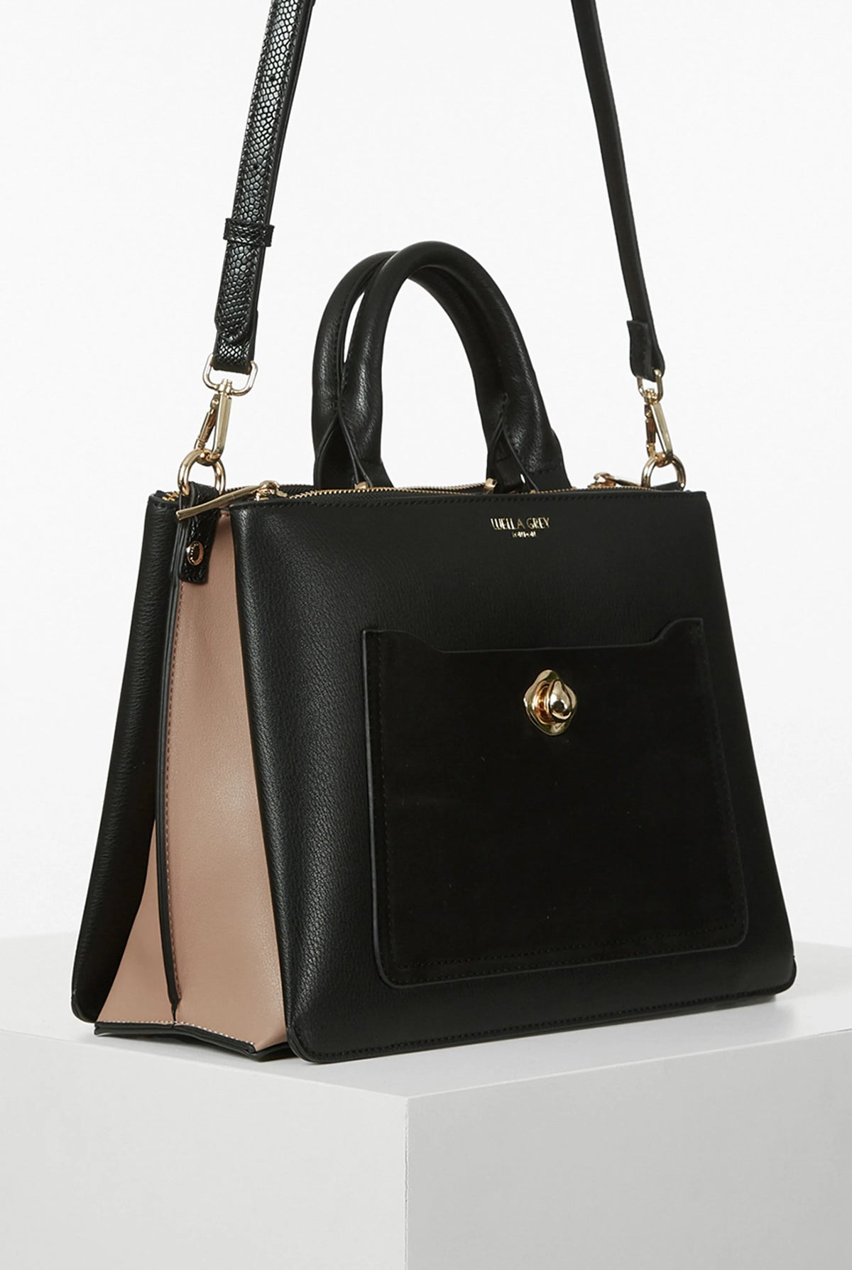 Black Luella Grey handbag with twin top handles, long strap, and gold clasp