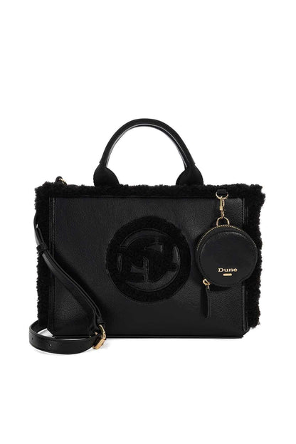 Dune London black faux-leather handbag with fuzzy trim, top handles, and logo patch.