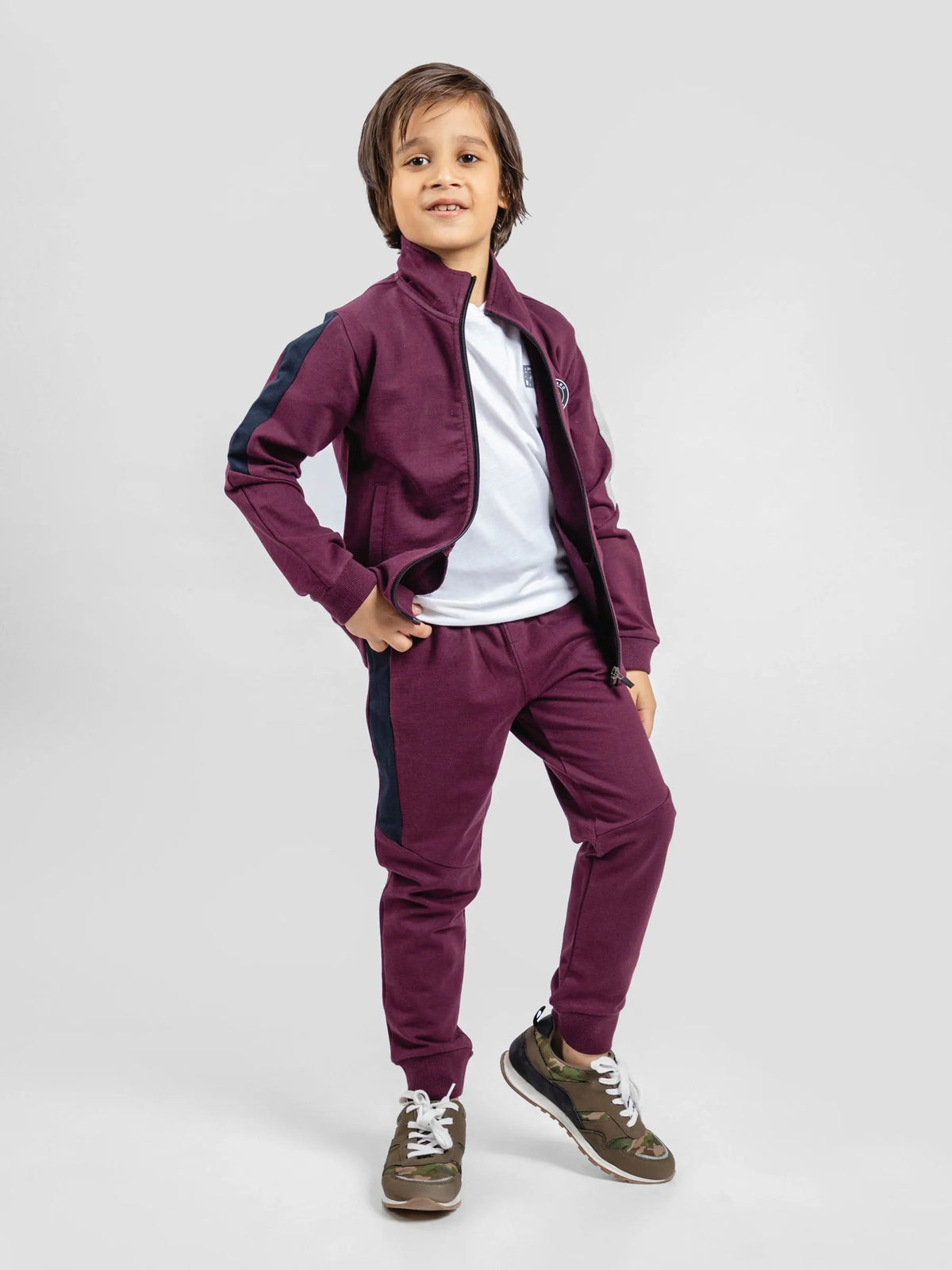 Burgundy kids zip-up tracksuit set with matching pants, front full-body view