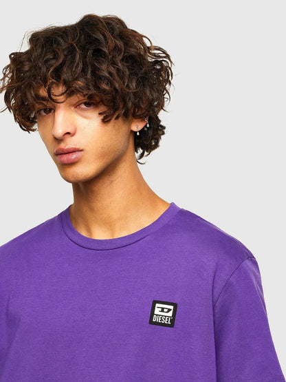 Purple crew-neck T-shirt with DIESEL logo patch on the chest