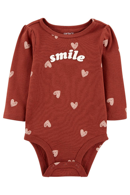 CARTER'S brown long-sleeve baby bodysuit with “smile” graphic and heart pattern