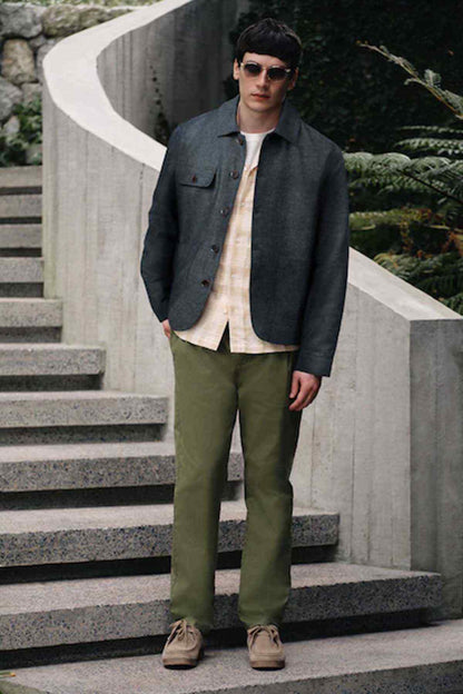 Olive green cotton trousers with button and zip fly, side pockets