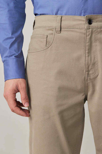 Tan chino pants with button waist and belt loops
