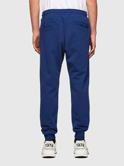 Blue sweatpants with elastic waistband and ribbed cuffs
