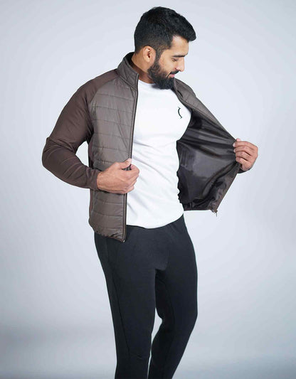 Dark brown quilted zip-up jacket open view, showing black inner lining
