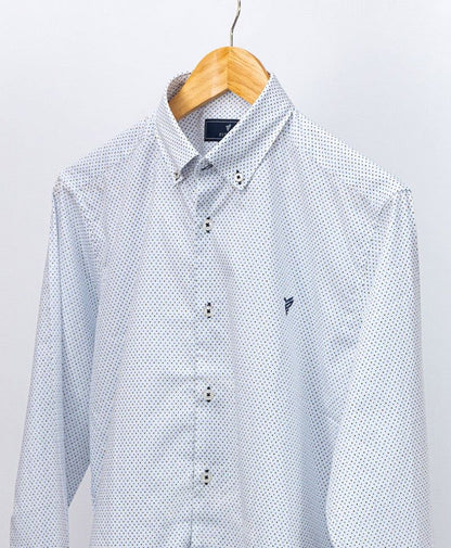 Fitted dress shirt with small blue pattern, button front, and hanging collar