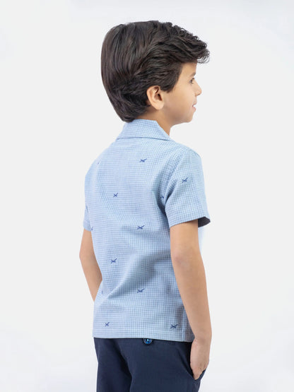 Light blue cotton short-sleeve button-up shirt, side view with allover print