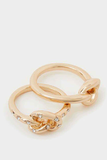 Gold twisted ring set with small clear stones, stacked look