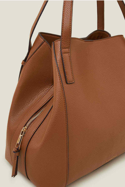 Tan leather handbag with zip pocket detail and front panel top strap