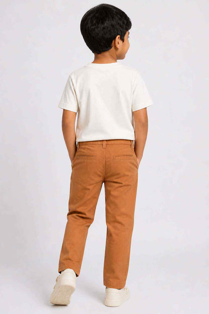 BABYSHOP orange kids pants shown from the back with belt loops