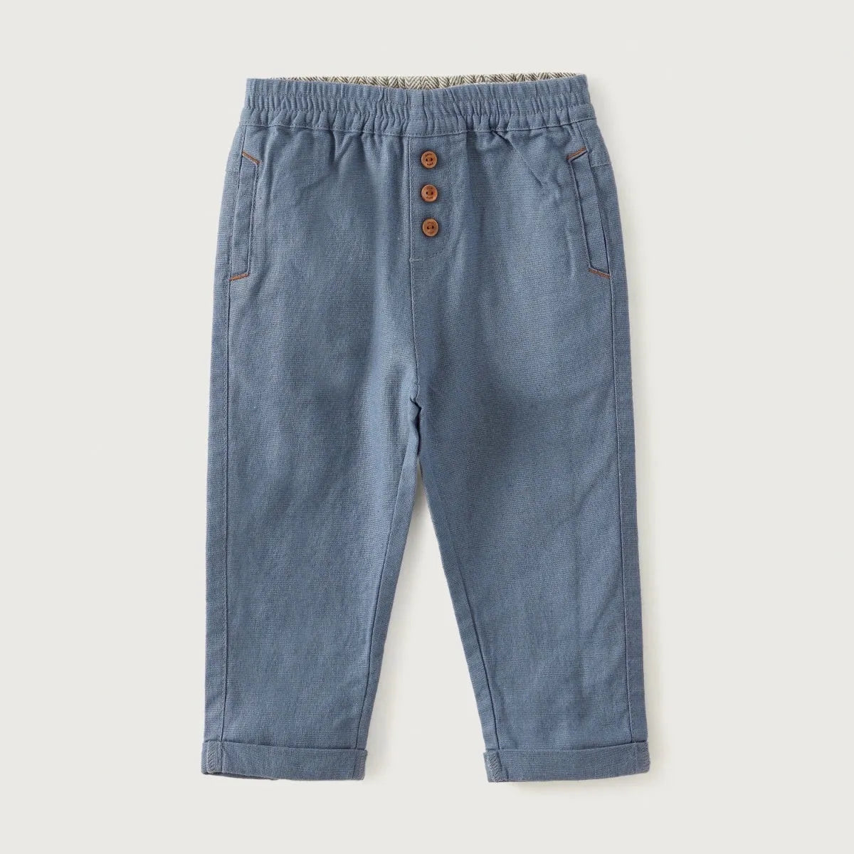 Blue baby trousers with elastic waistband, button placket, and front pockets
