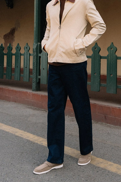 Dark blue straight-leg jeans with zip fly and ankle-length hem
