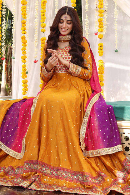Orange flared embroidered maxi dress with red-pink dupatta and gold border at hem