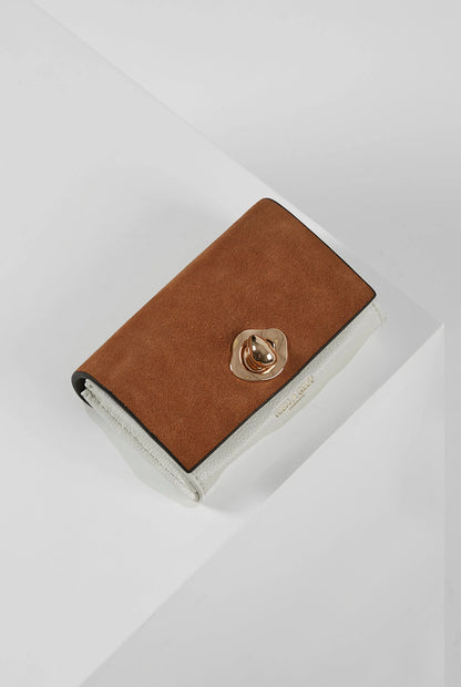 Brown leather wallet with gold-tone snap clasp and stitched white trim