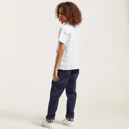 Navy blue pants with drawstring waist and relaxed straight-leg fit