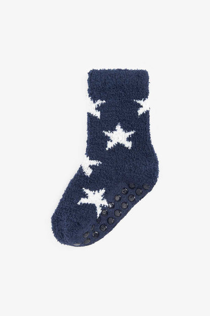 Fuzzy navy socks with white star pattern and rubber grip dots