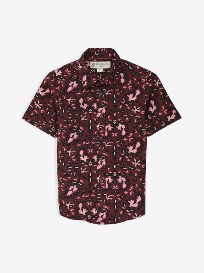 Burgundy boys short-sleeve button-up shirt with pink abstract camo print