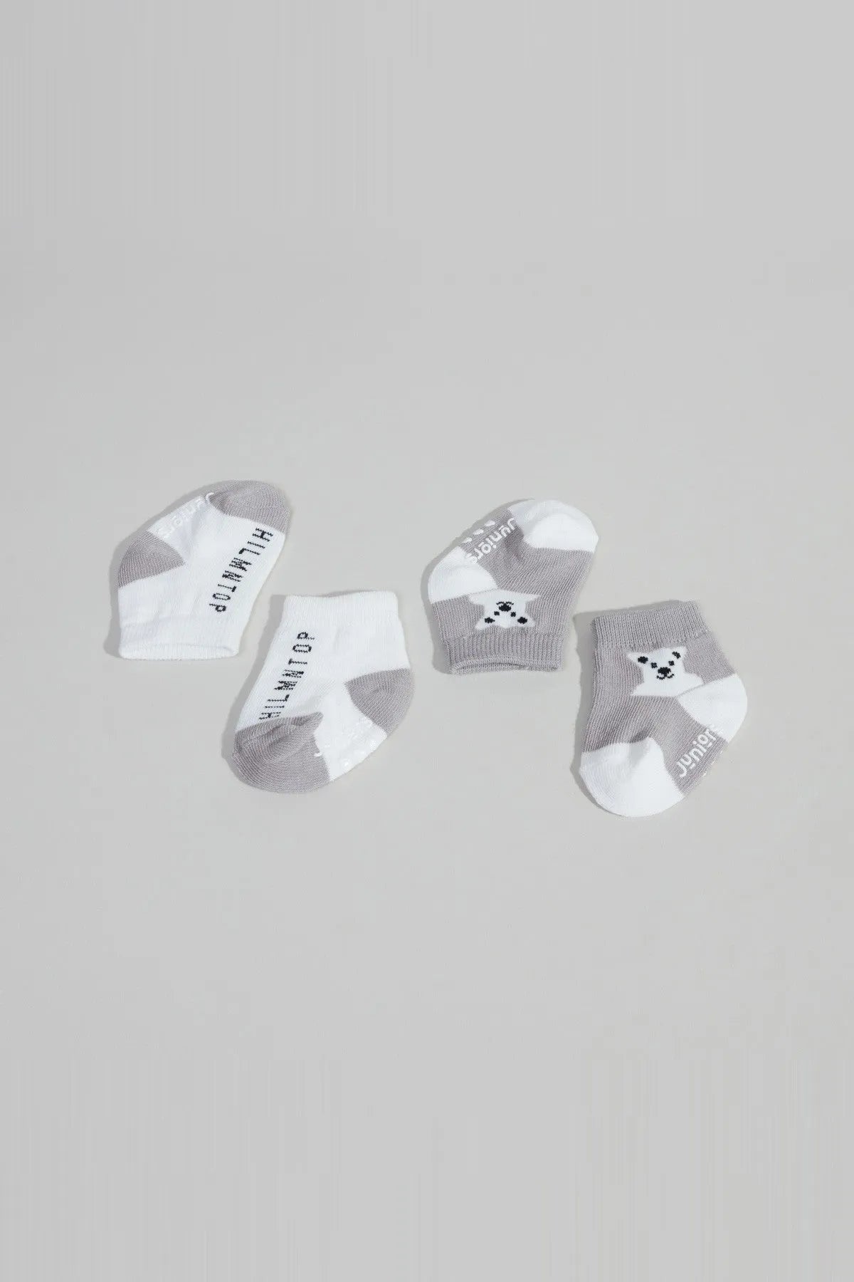 Baby socks set of four: white pairs and grey pairs with bear face appliques