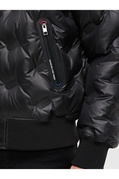 Black puffer jacket detail with front zip and side pocket