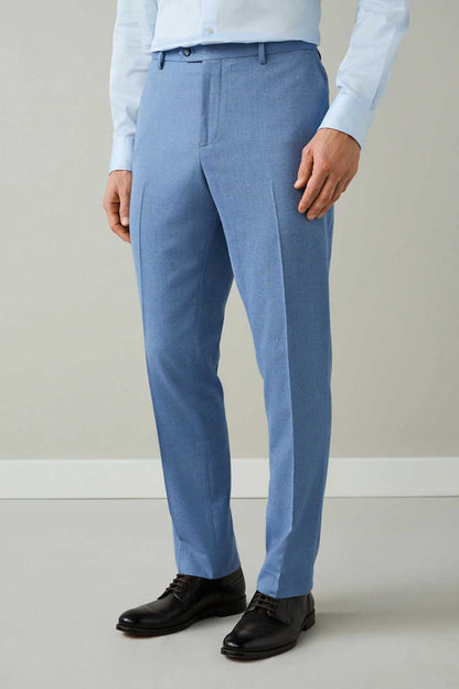 Men's chambray blue dress trousers with belt loops, zip fly, side crease