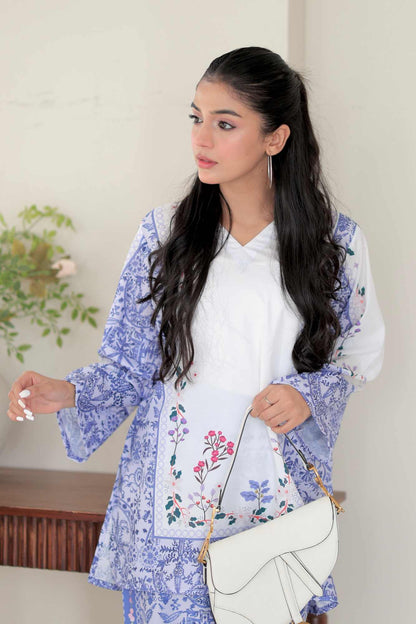 Womenâ€™s blue floral printed kurta with white inner top, long sleeves and side tie