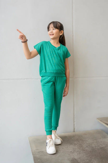 Teal kids tracksuit set with short-sleeve tee and jogger pants, side view