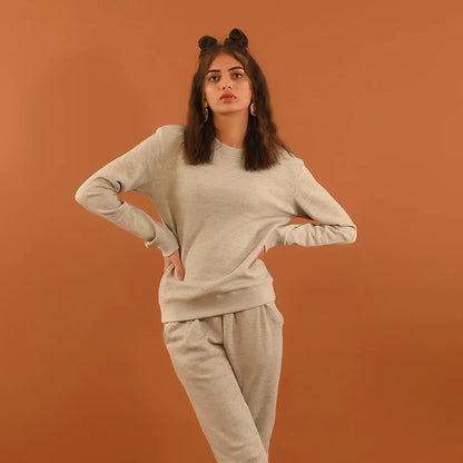 Light gray sweatshirt and jogger set with crew neck and cuffed pant hems