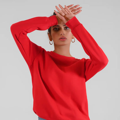 Red crewneck long-sleeve sweatshirt with relaxed fit and wide cuffs
