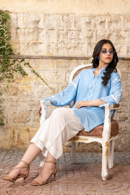 Dhaga light blue embroidered tunic with scalloped cuffs and cream-white straight pants