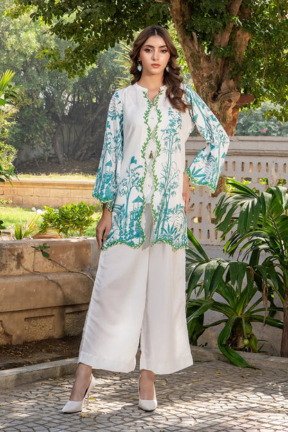 White long kurta with blue botanical print panel and green trim, straight bottoms