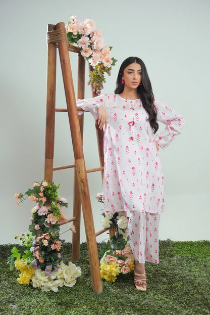 Women's white floral kurta and pajama set, long sleeves with pink print