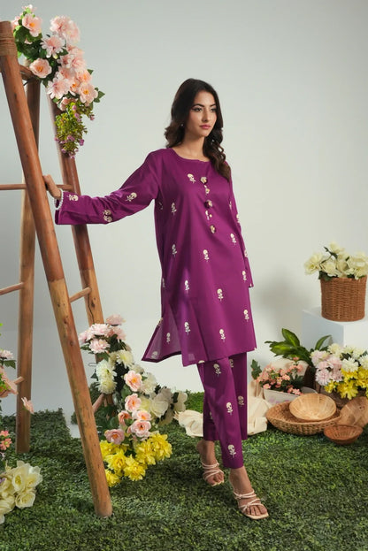 Purple kurta set with embroidered motifs and matching leggings, long sleeves