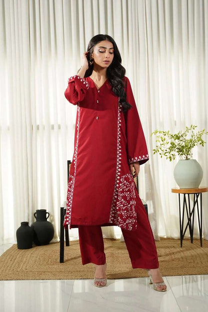 Dhaga women's red long kurta with embroidered trim and matching straight pants set
