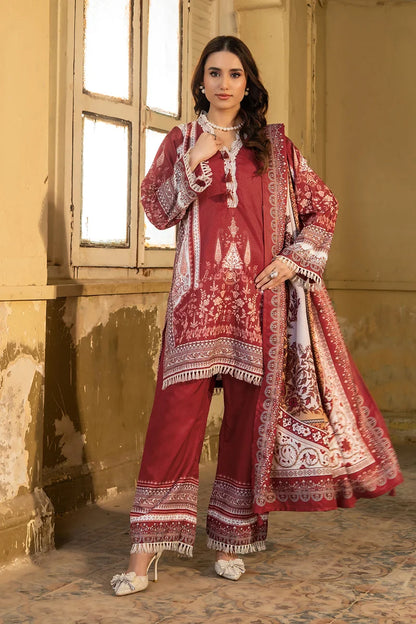 Maroon embroidered kurta set with white trim, matching pants, and patterned dupatta