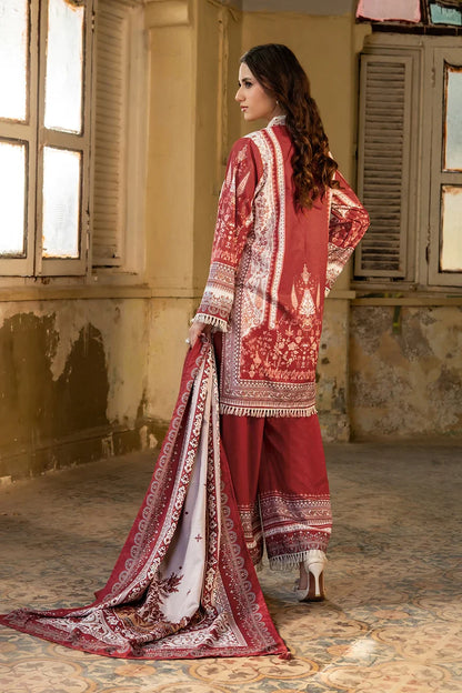 Maroon embroidered kurta with matching pants and dupatta, side view