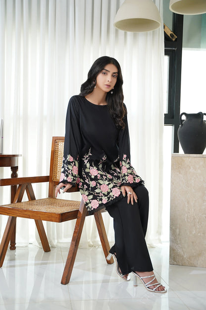 Dhaga black tunic with pink floral cuffs and hem, black loose pants