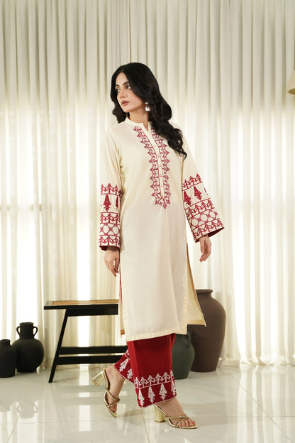 Cream embroidered kurta set with red geometric trim, long tunic and straight pants
