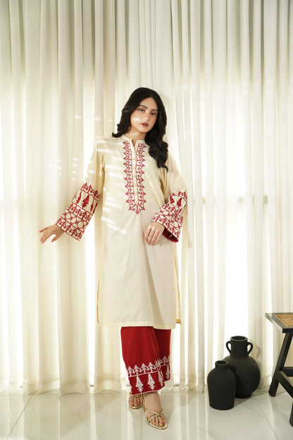 Cream kurta set with red embroidered cuffs, long tunic and matching pants