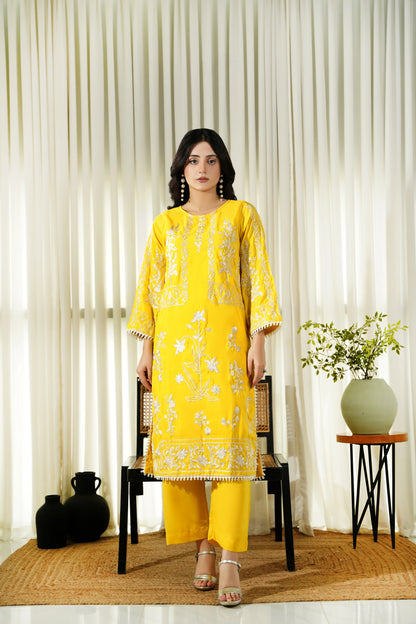 Dhaga women's yellow printed kurta set with flared hem and matching trousers