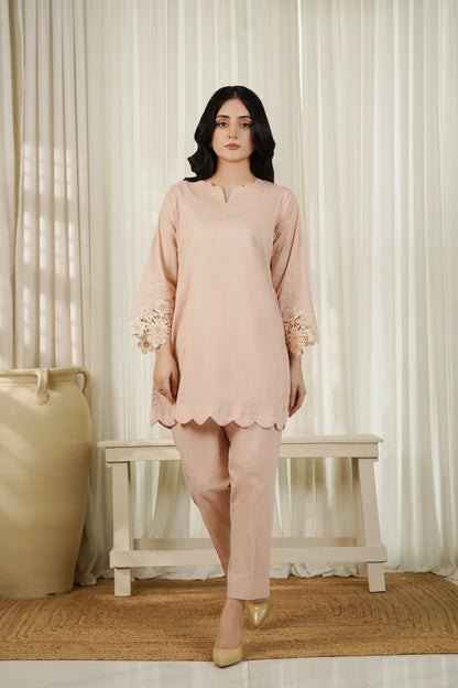 Dhaga pale pink long tunic with scalloped hem and floral embroidered cuffs, matching trousers