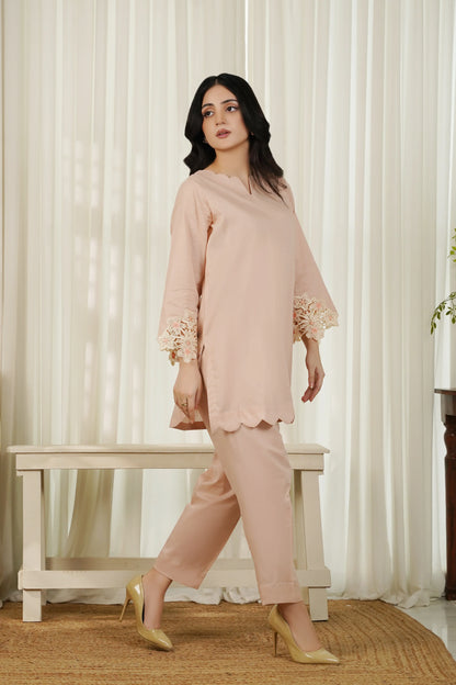 Dhaga pale pink tunic and straight pants set with scalloped hem and embroidered cuffs