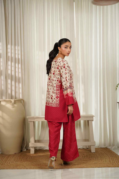 Floral cream kurta and maroon pants with red panel hem, back/side view.
