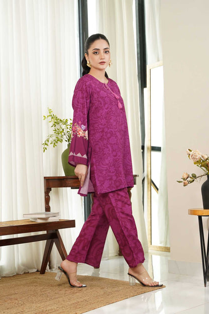 Women's purple kurta tunic with matching flared pants, embroidered hem
