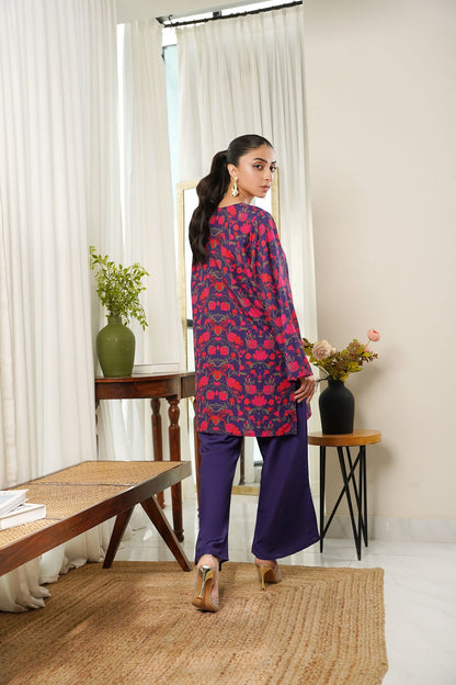 Dhaga red and navy patterned tunic with dark purple wide-leg pants, side view
