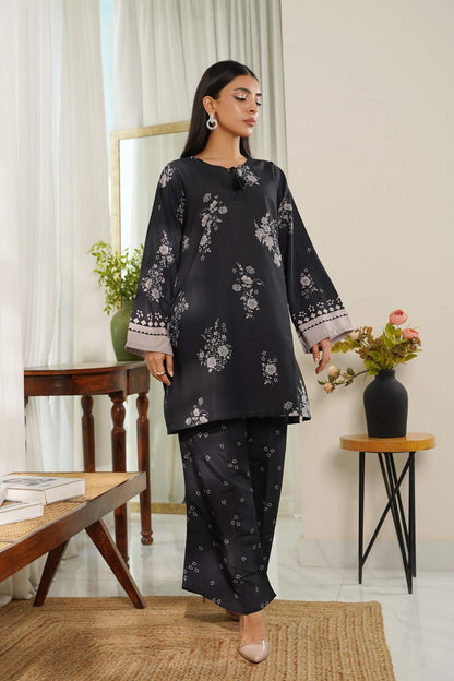 Black floral kurta with patterned hem and matching wide-leg pants