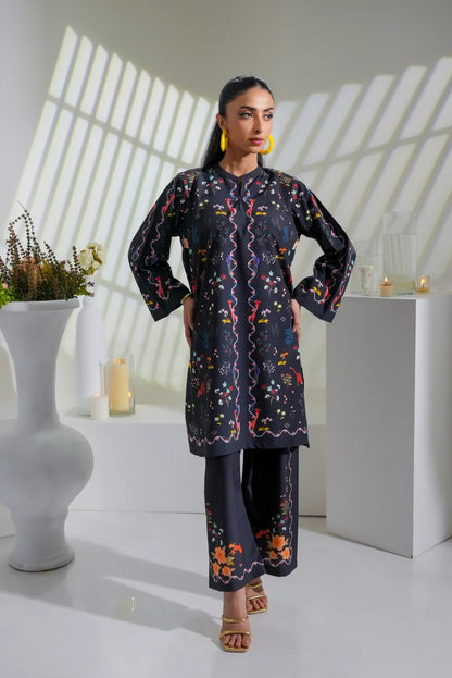 Women's black floral-print long kurta set with coordinating straight-leg trousers