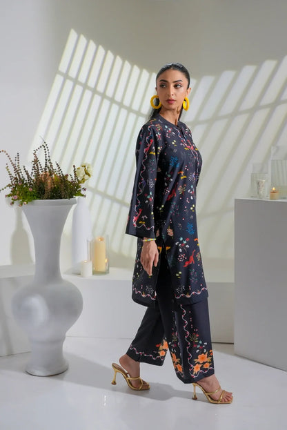 Women's black floral-print long kurta with coordinating pants and long sleeves