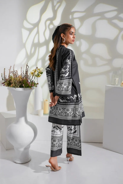 Black kurta and pants set with bold white borders and central print