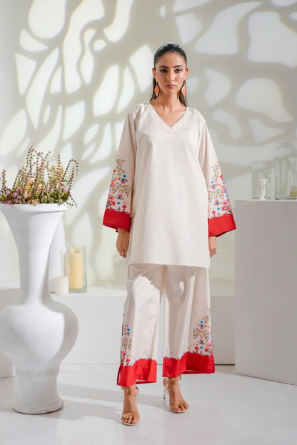 Dhaga white kurta with floral sleeves, red cuffs, and matching pajama pants